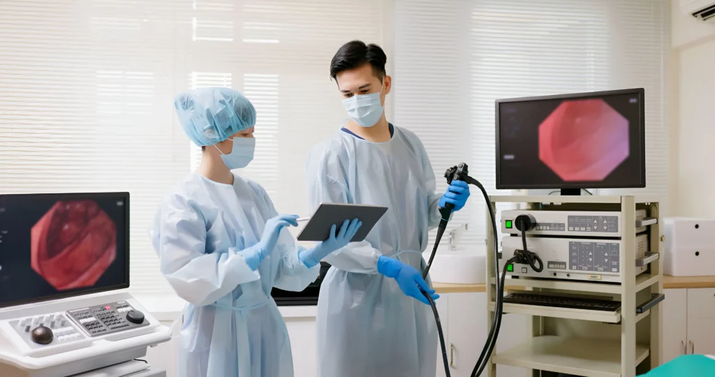 Doctors reviewing colonoscopy images of a patient